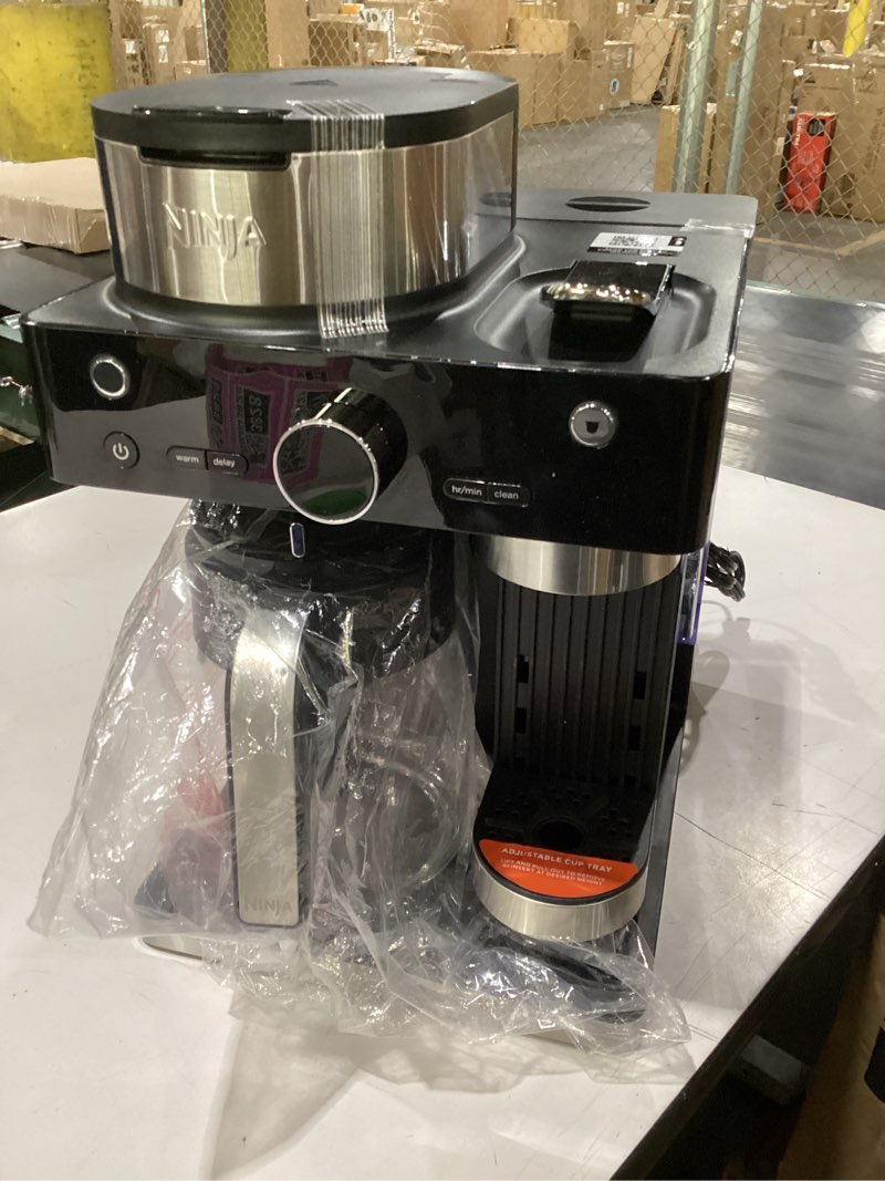 Condition photo showing As Is for maged ninja espresso & coffee maker & barista system, 3 espresso brew styles, single-serve coffee & nespresso capsule compatible, built-in frother, espresso, cappuccino & latte maker, black, cfn601a