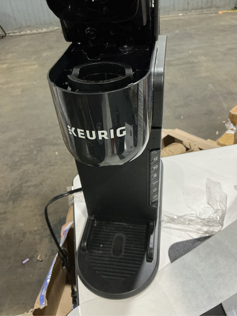 Condition photo showing As Is for keurig k-express single serve k-cup pod coffee maker, 3 brew sizes, strong button feature, 42oz removable reservoir, black