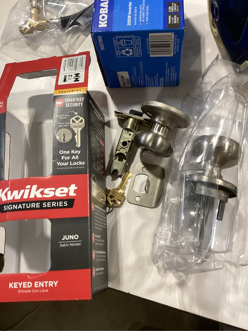 Condition photo showing As Is for kwikset juno satin nickel smartkey keyed entry door knob