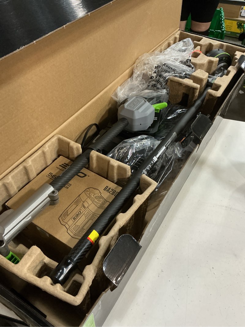 Condition photo showing As Is for ego power+ multi-head system with line iq, powerload 56-volt 17-in straight shaft attachment capable battery string trimmer 5 ah (battery included) (charger included)