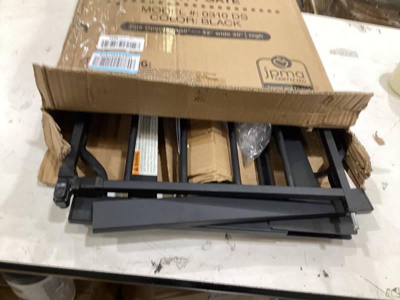 Condition photo showing As Is for regalo safety 30-41.5” extra wide baby gate for doorways & bottom of stairs, pressure mounted wood accent gate with door, tested & safe for 30 years, american designed, american owned black wooden - 30-41.5"w x 30"h