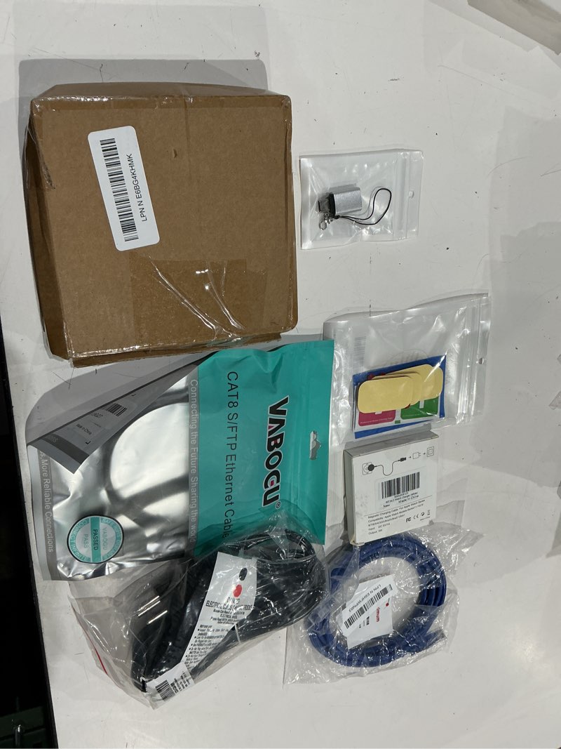 Condition photo showing As Is for assorted lot of electronics (headphones, small gadgets, headsets, etc.) 