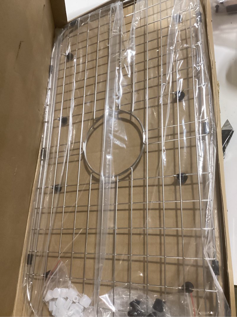Condition photo showing Good Condition for Serene Valley Sink Protector Grid 26-1/16" x 14-1/16", Centered Drain with Corner Radius 3-1/2", 304 Stainless Steel Material NLW2614C