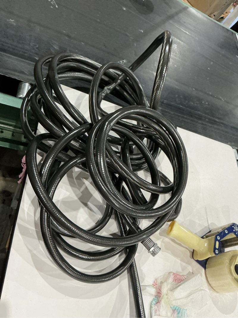Condition photo showing As Is for neverkink teknor apex 5/8-in x 50-ft heavy kink free vinyl gray coiled hose