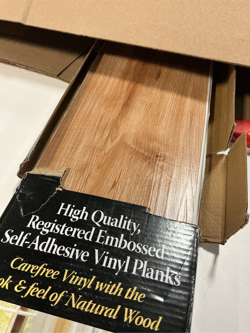Condition photo showing Good Condition for Tivoli II Self Adhesive Vinyl Floor Planks, 10 Pack - 6" x 36", Rustic Oak - Peel & Stick, DIY Flooring - Natural Wood Grain Feel for Kitchen, Dining Room & Bedrooms by Achim Home Decor