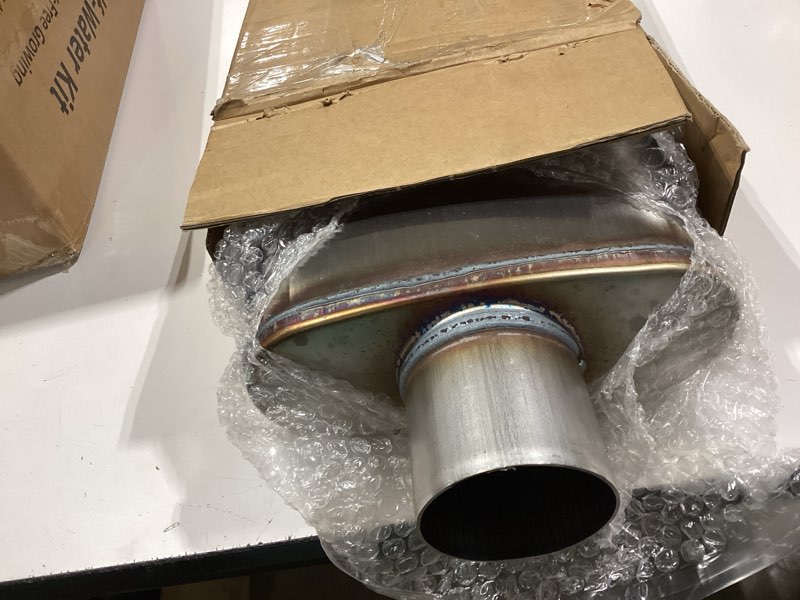 Condition photo showing As Is for universal 409 stainless muffler straight-through performance muffler exhaust, center in | center out (3")