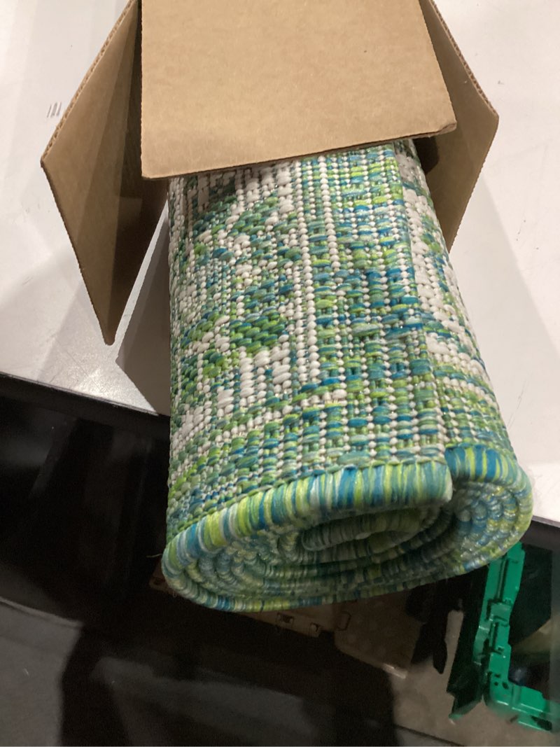 Condition photo showing As Is for (similar to )jonathan y weave floral indoor outdoor area rug 8x10 cream/green, tela bohemian textured for backyard, patio, porch, easy-cleaning, high traffic, pet-friendly, non-shedding (smb100f-8) cream/green 7'9\" x 10' (rectangular)