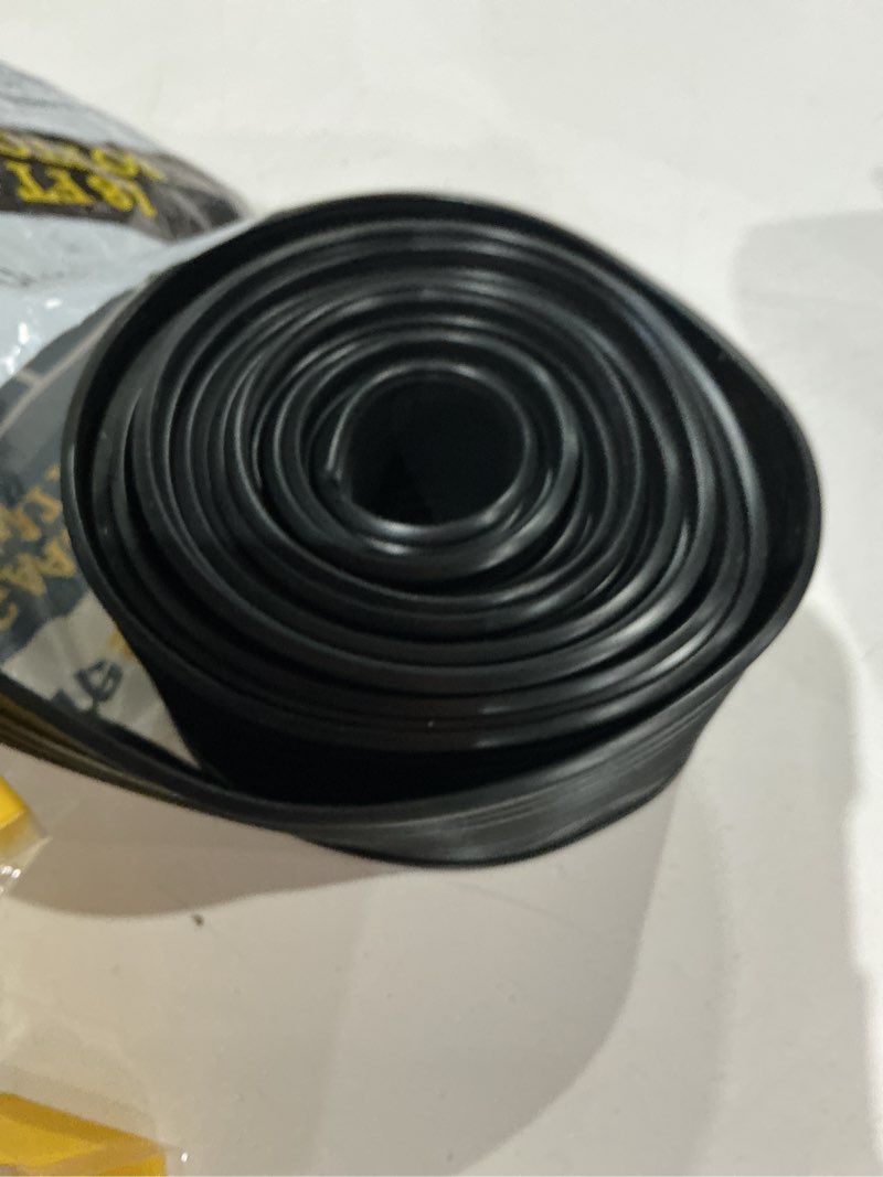 Condition photo showing As Is for wayne dalton 18-ft x 3-in x 0.6 mils black vinyl garage weatherstrip