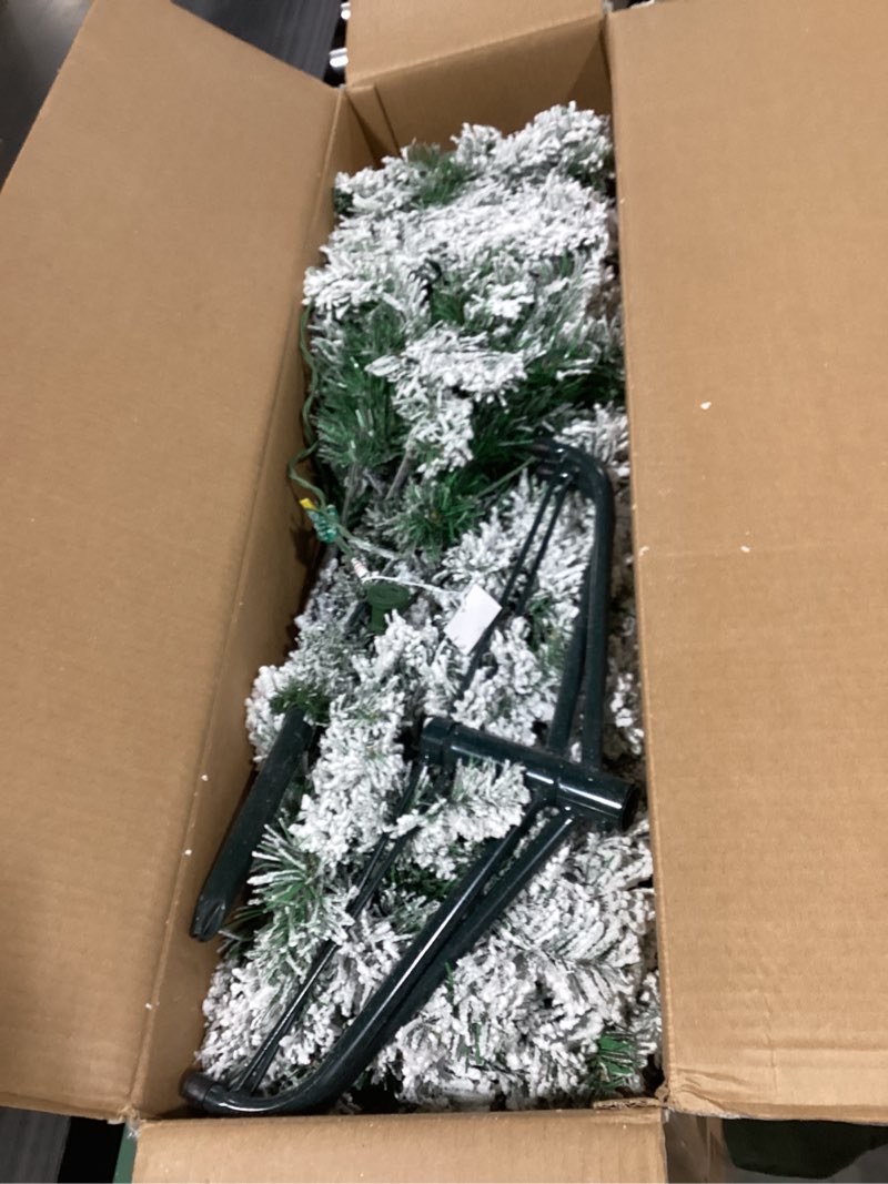 National Tree Company 6 ft Pre-Lit Flocked Acacia Slim Artificial Christmas Tree, 250 Clear Lights, 