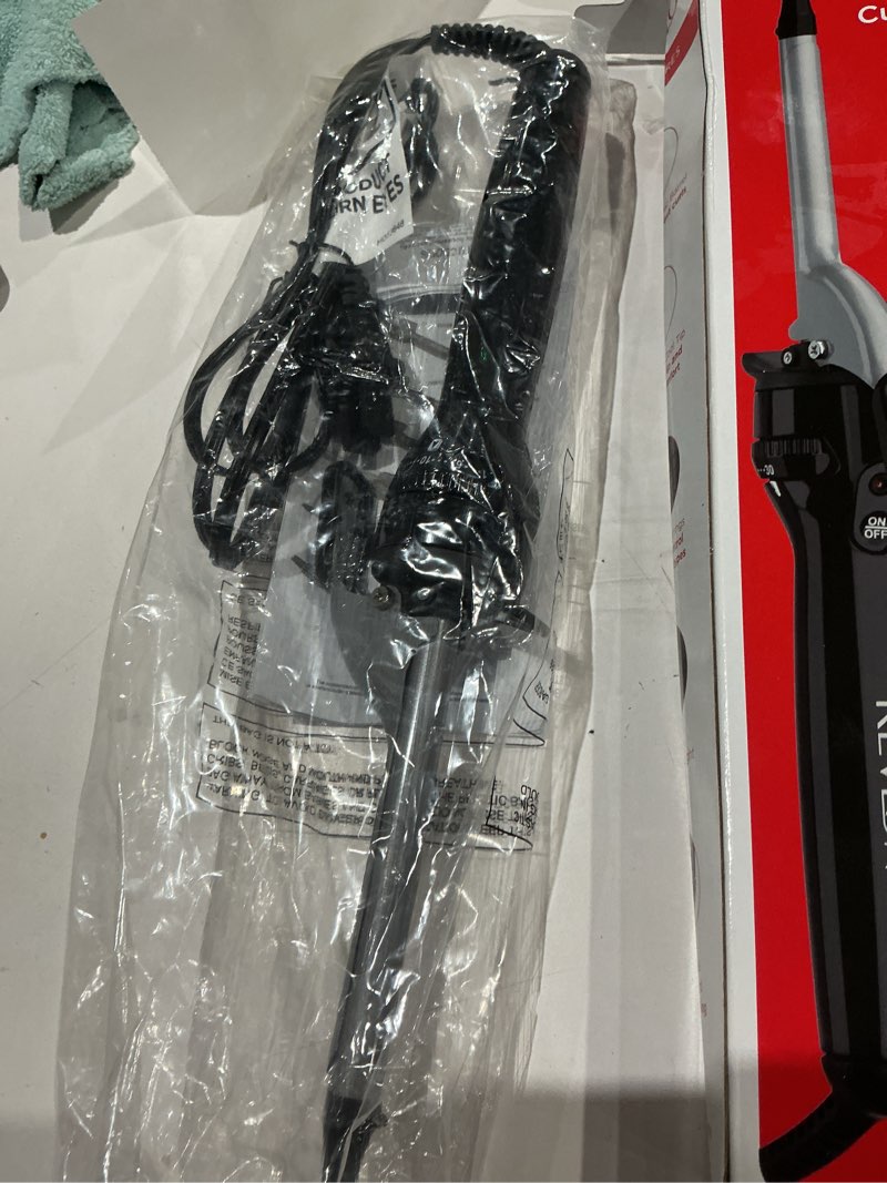 Condition photo showing Good Condition for revlon perfect heat 1/2" triple ceramic curling iron, black