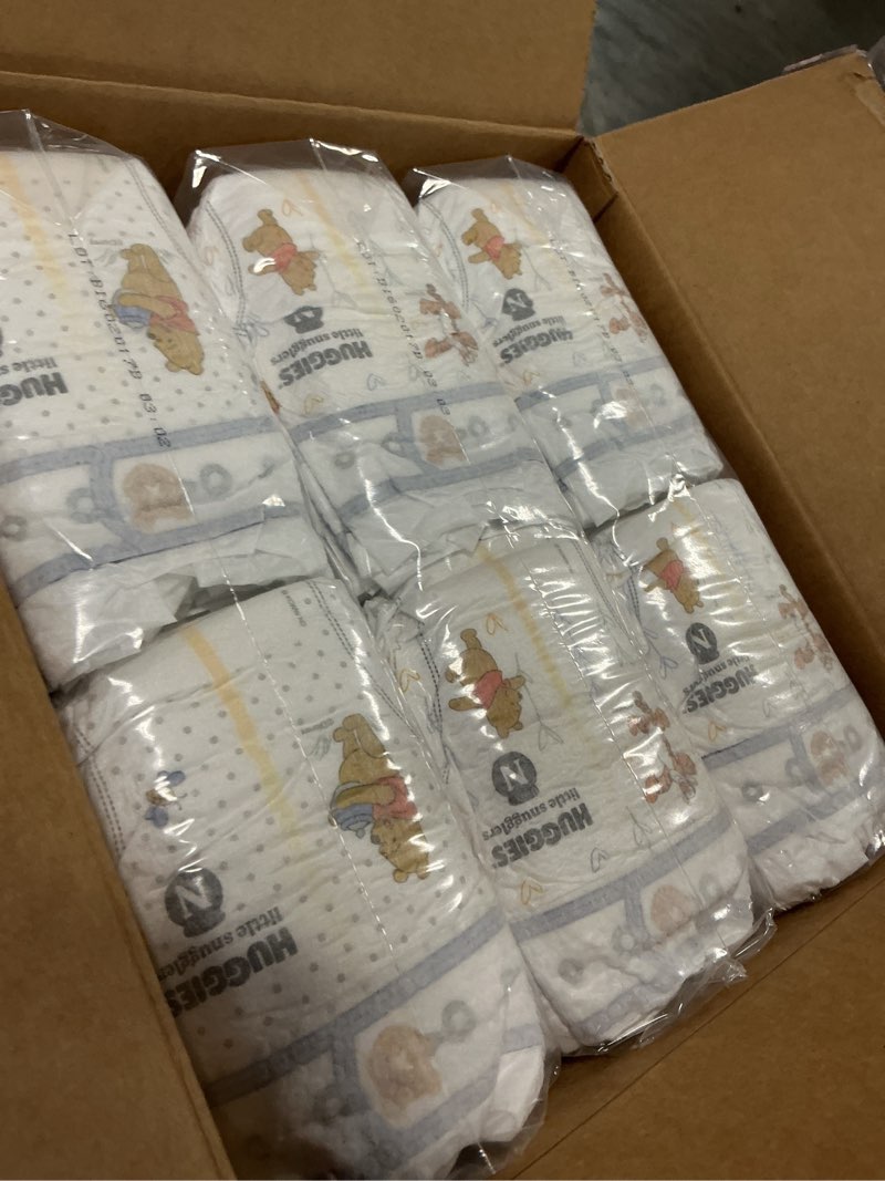 Condition photo showing Good Condition for Huggies Size Newborn Diapers, Little Snugglers Baby Diapers, Size Newborn (up to 10 lbs), 144 Count, Packaging May Vary