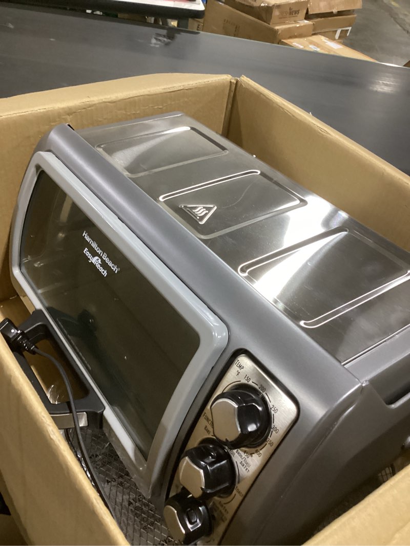 Condition photo showing Good Condition for hamilton beach air fryer toaster oven combo with large capacity, fits 6 slices or 12” pizza, 4 cooking functions for convection, bake, broil, roll-top door, easy reach sure-crisp, stainless steel