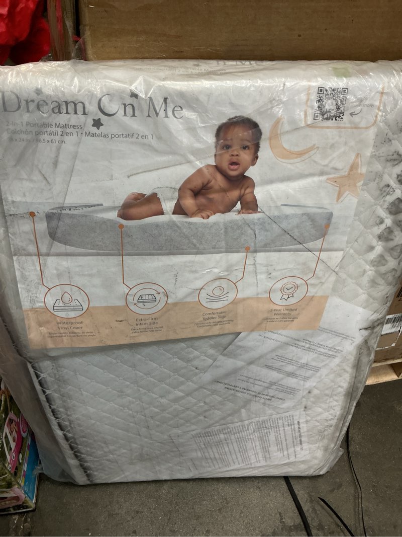 Condition photo showing As Is for dream on me 3" portable crib mattress white vinyl polyester fiber fits crib