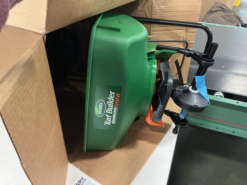 Condition photo showing Good Condition for Scotts Turf Builder EdgeGuard Mini Broadcast Spreader for Seed, Weed and Feed, Fertilizer, Salt, Ice Melt, Push Spreader Holds up to 5,000 sq.ft. Product