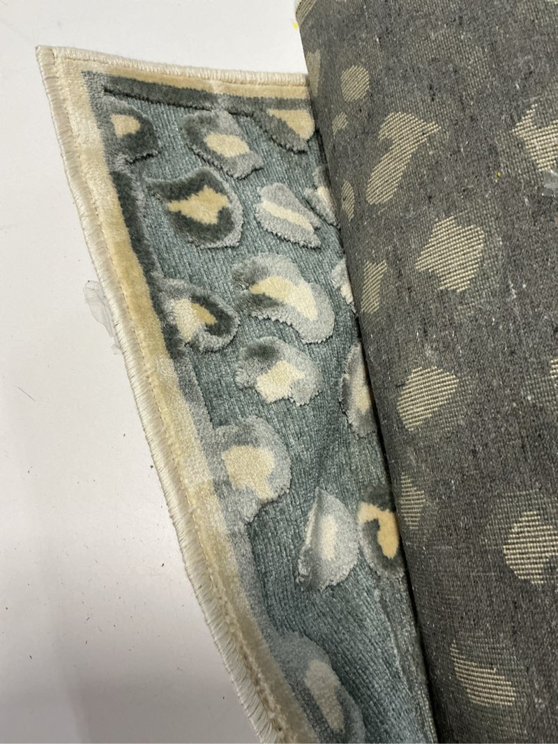 Condition photo showing Good Condition for safavieh paradise collection area rug - 5'3" x 7'6", cream & multi, animal print viscose design, ideal for high traffic areas in living room, bedroom (par84-2440) 5'3" x 7'6" (rectangular) rectangular cream/multi