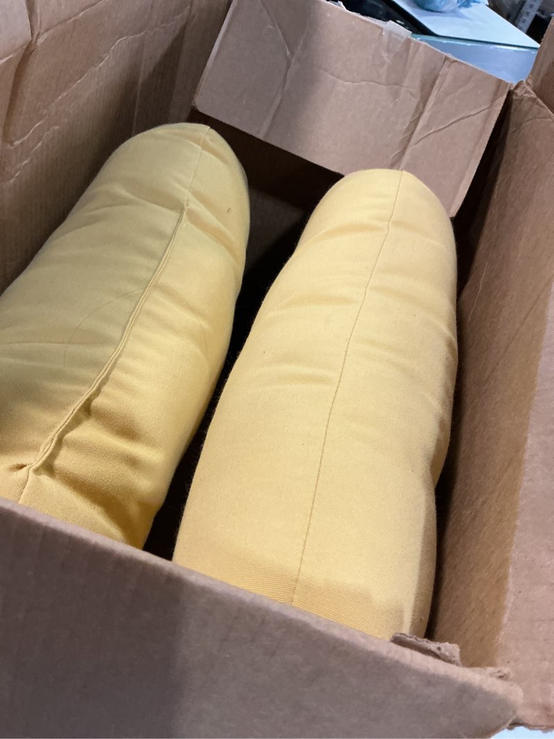 Condition photo showing As Is for Pillow Perfect Fortress Solid Indoor/Outdoor Wicker Patio Sofa/Swing Cushion Tufted, Weather and Fade Resistant, 19" x 44", Yellow Yellow 19" x 44"
