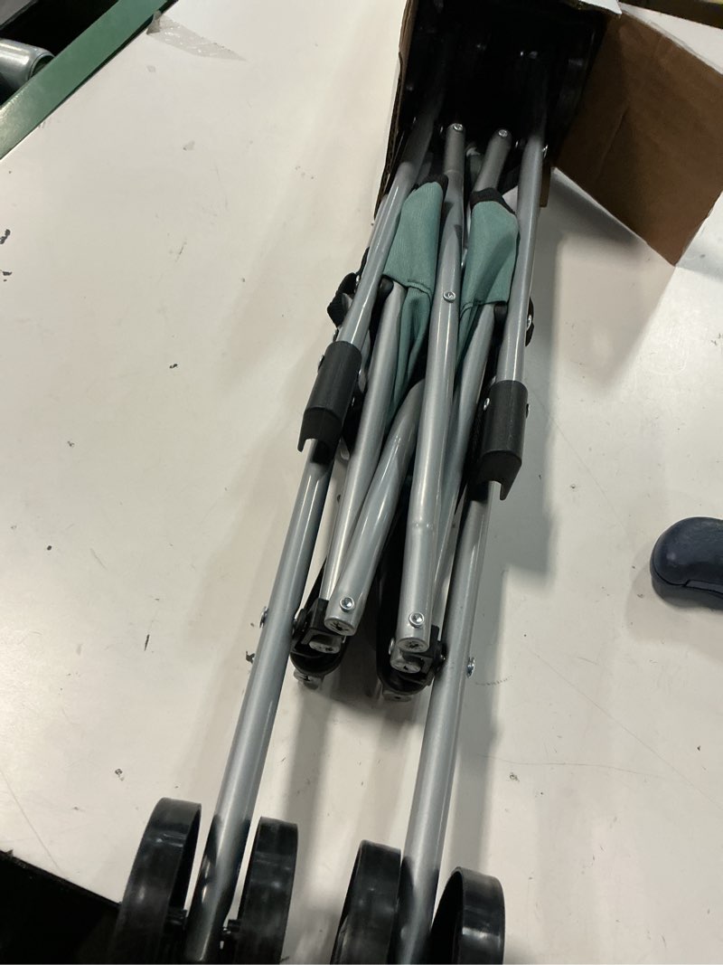 Condition photo showing Good Condition for bayer umbrella stroller for dolls - green & white stars, compact foldable design, ages 3+