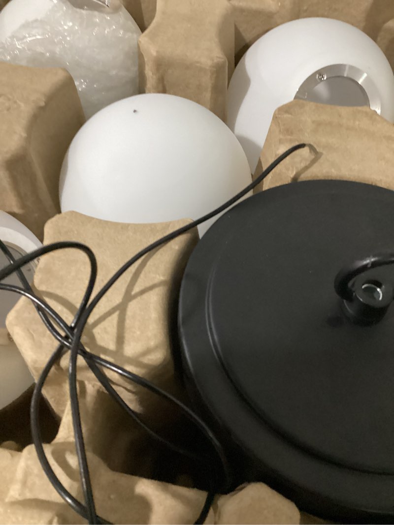 Condition photo showing As Is for origin 21 maren 4-light matte black modern/contemporary led chandelier