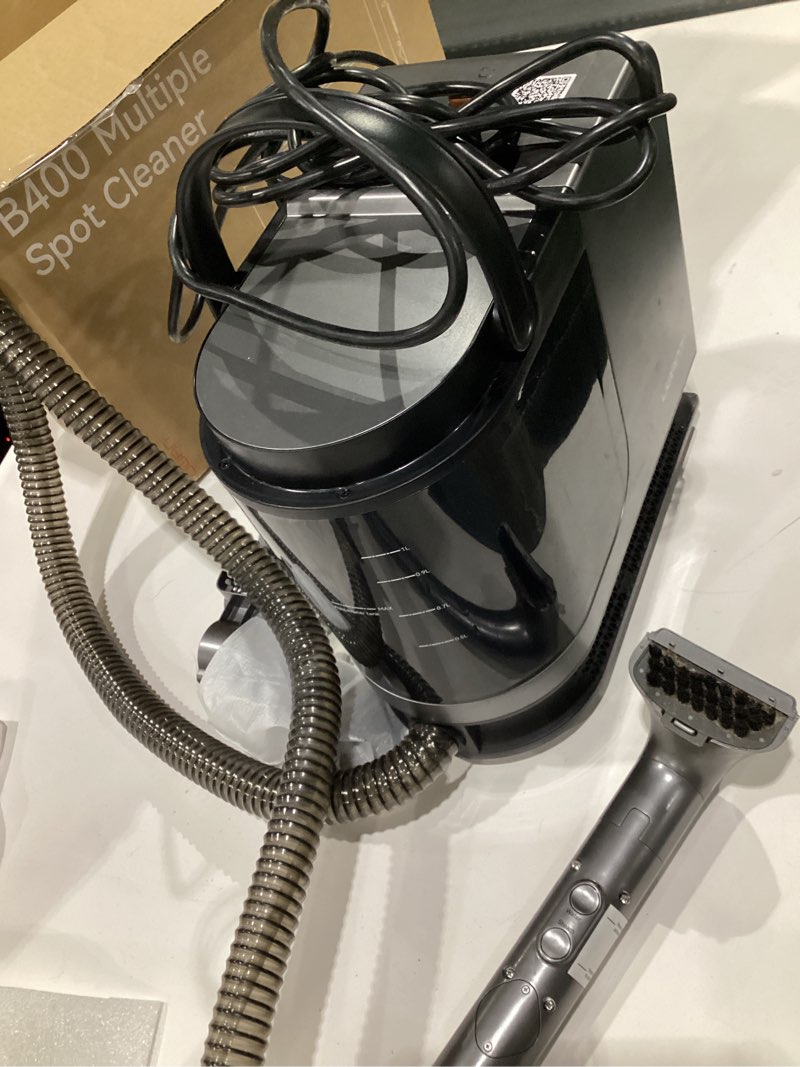 Condition photo showing As Is for uwant Portable Carpet Cleaner with Steam& Heating System 18Kpa Powerful Suction Carpet Cleaner with 4 Cleaning Tools& Solution 2 in 1 Upholstery Cleaner Steam Cleaner for Pets, Car USED