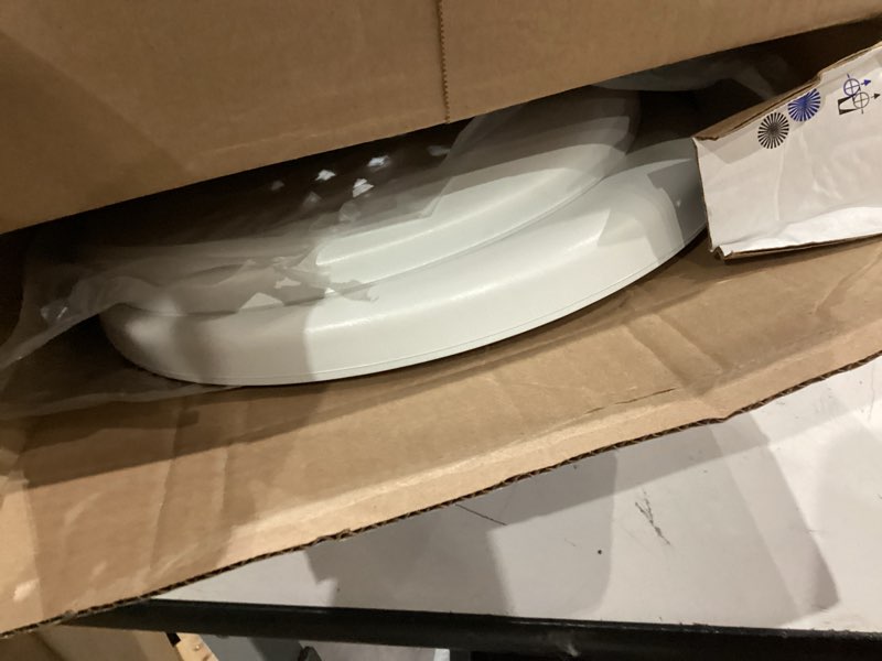 Condition photo showing As Is for mayfair by bemis eden cushioned vinyl white round padded toilet seat