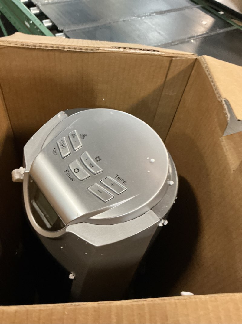 Condition photo showing As Is for comfort zone portable 1500w ceramic oscillating digital tower space heater