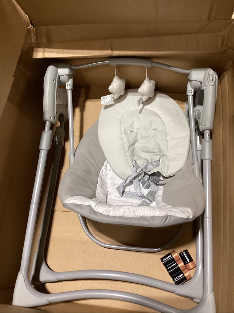 Condition photo showing Good Condition for Graco Slim Spaces Compact Baby Swing, Space Saving Portable Bay Swing with Height Adjustable Legs & Soft Toys, Reign