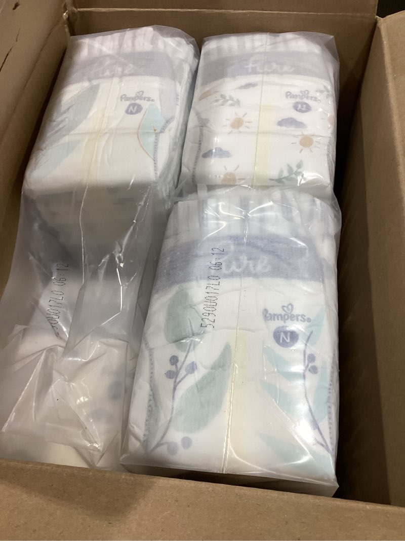 Condition photo showing As Is for Pampers Pure Protection Baby Diapers, Size 0 (10 lbs ), 128 Count, Up to 100% Leakproof, Premium Plant-based Skin Protection, Hypoallergenic Soft Diapers Newborn 128