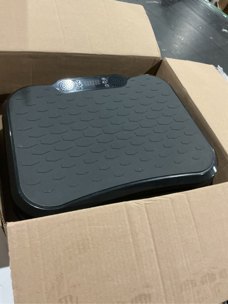 Condition photo showing As Is for mini vibration plate , black