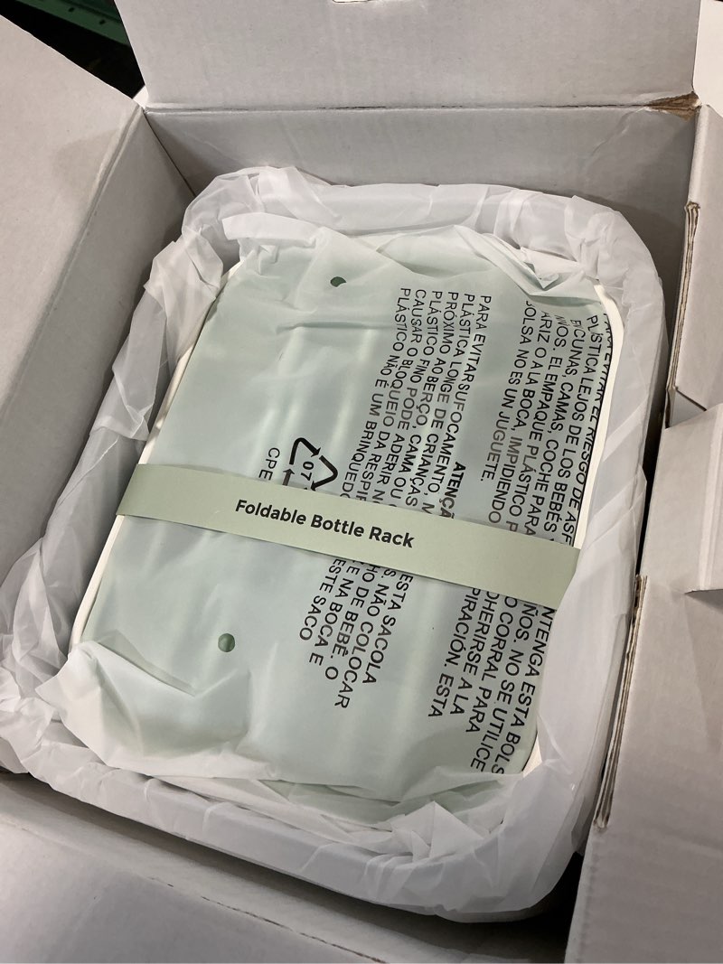 Condition photo showing Good Condition for momcozy bottle sterilizer and dryer, modular nesting space saving design, 6 bottles capacity, 4 in 1 compact sterilizer for baby bottles, breast pump parts & newborn essentials, drying rack included