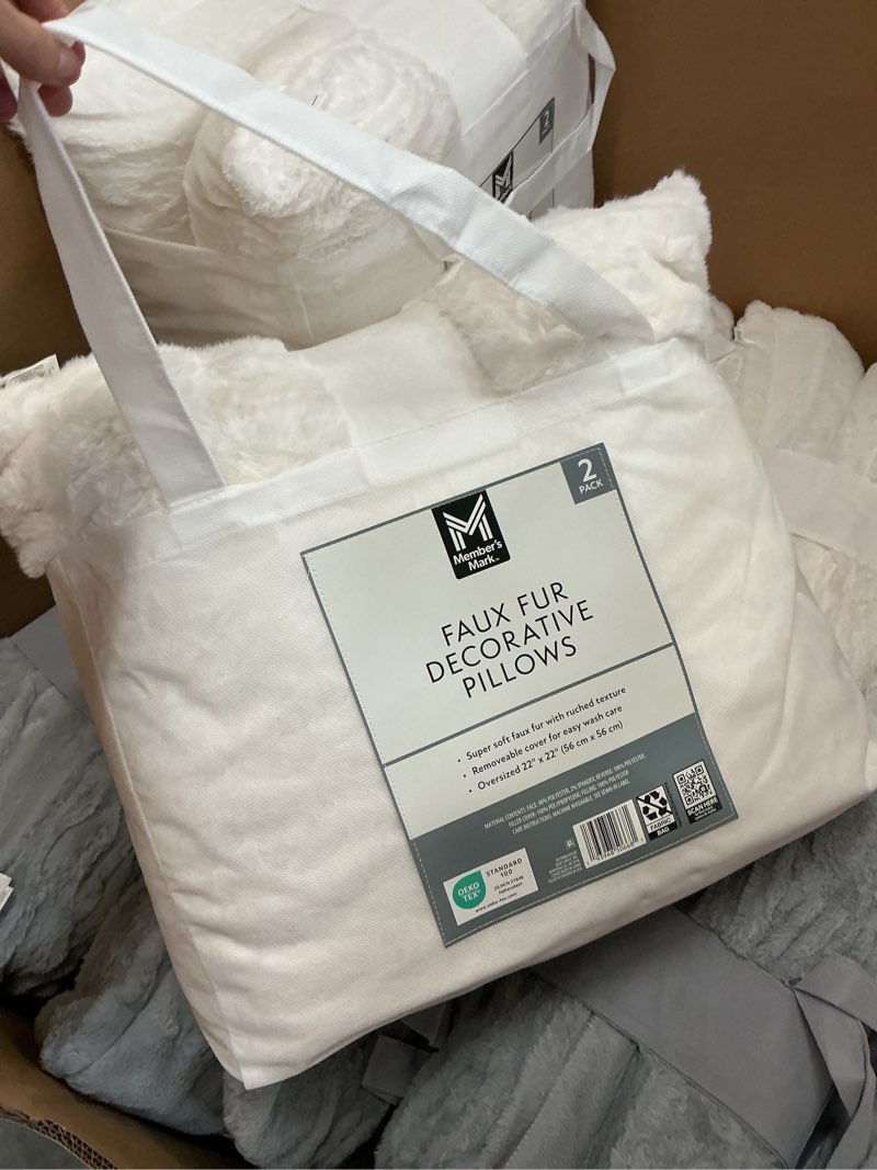 Condition photo showing New/Like New for member's mark 2-pack ruched faux fur decorative pillows, 22" x 22"