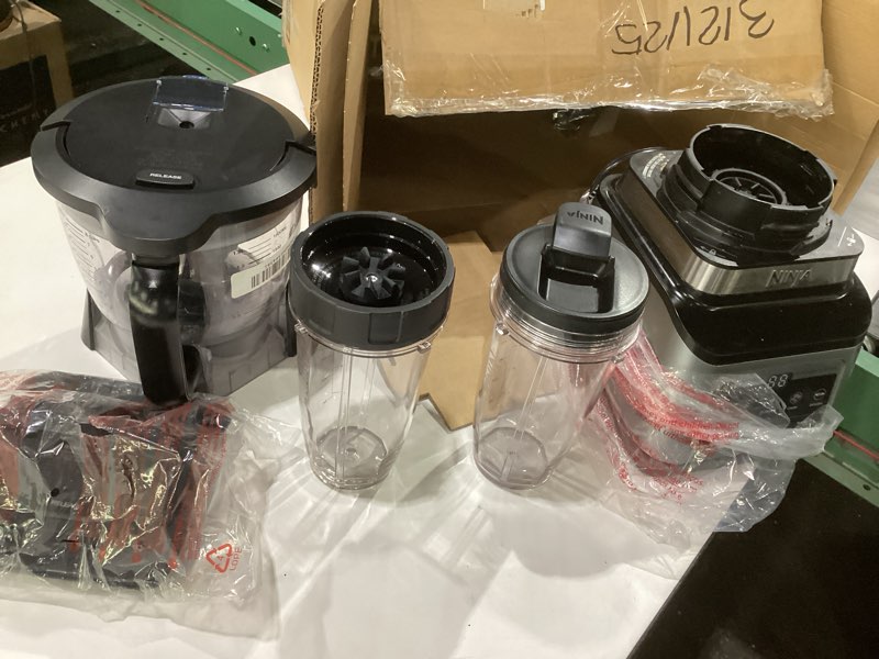 Condition photo showing As Is for ninja bn801 professional plus kitchen system, 1400 wp, 5 functions for smoothies, chopping, dough & more with auto iq, 72-oz.* blender pitcher, 64-oz. processor bowl, (2) 24-oz. to-go cups, grey 64 oz. blender + kitchen system, used, not tested