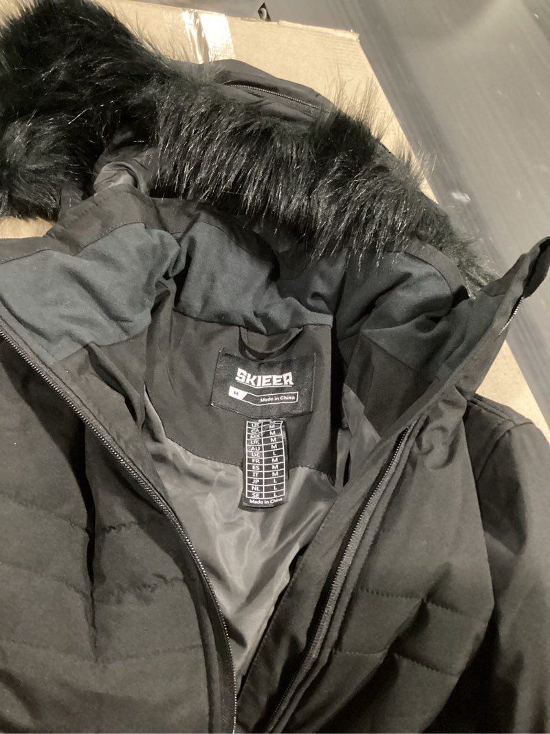 Condition photo showing Good Condition for skieer women's waterproof ski jacket warm puffer jacket thick hooded winter coat medium black