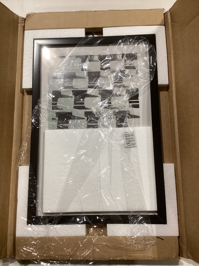 Condition photo showing As Is for 12x18 Poster Frame with Polished Plexiglass - Streamline Collection - Thin Border Picture Frame for Wall Display - Hanging Hardware Included - Black Black 12x18