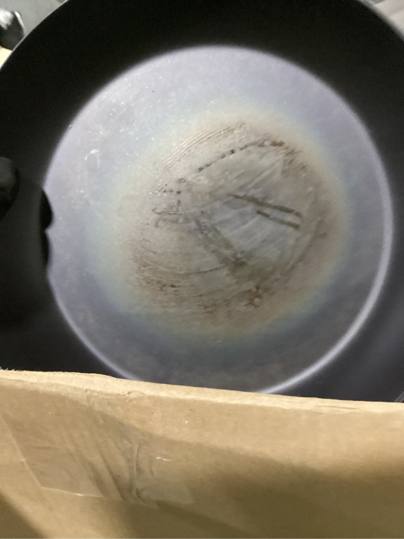 Condition photo showing As Is for OXO Obsidian Pre-Seasoned Carbon Steel, 12" Frying Pan Skillet with Removable Silicone Handle Holder, Induction, Oven Safe, Black