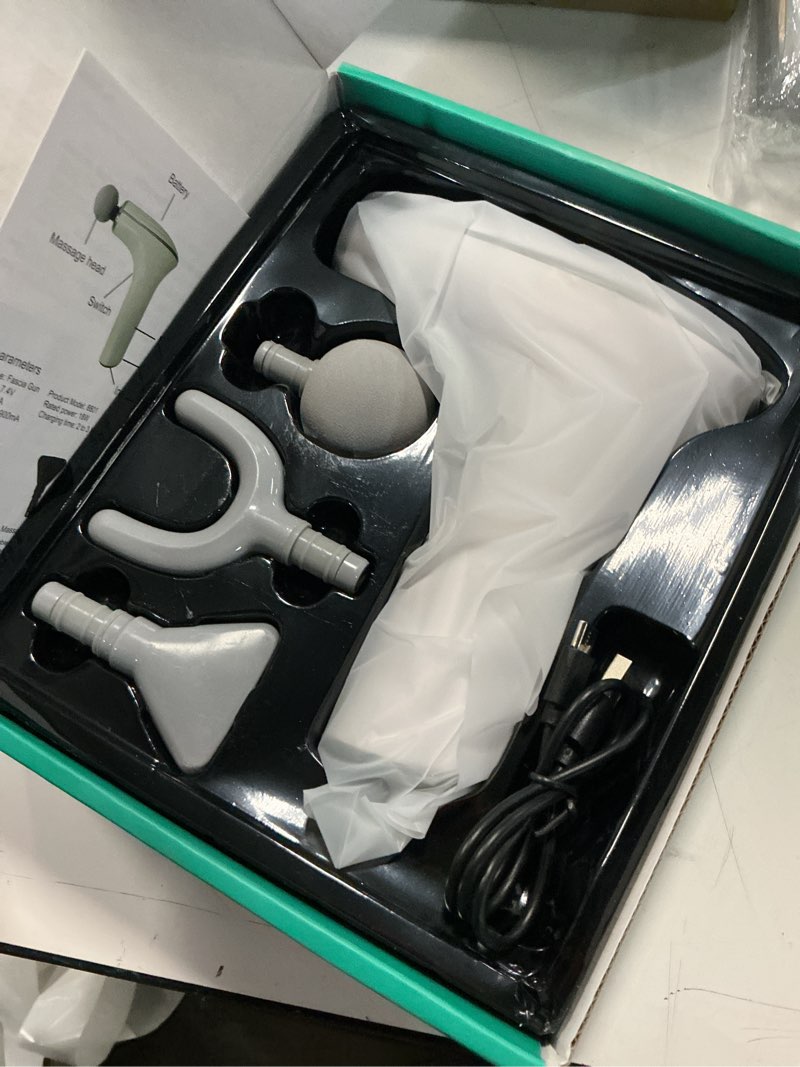 Condition photo showing New/Like New for deep tissue massage gun, portable percussion muscle massager with four interchangeable heads, useful for athletes, gym, office (white)