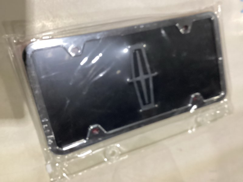 Condition photo showing Good Condition for Au-Tomotive Gold, INC. Lincoln Black Acrylic License Plate with Chrome Frame Kit
