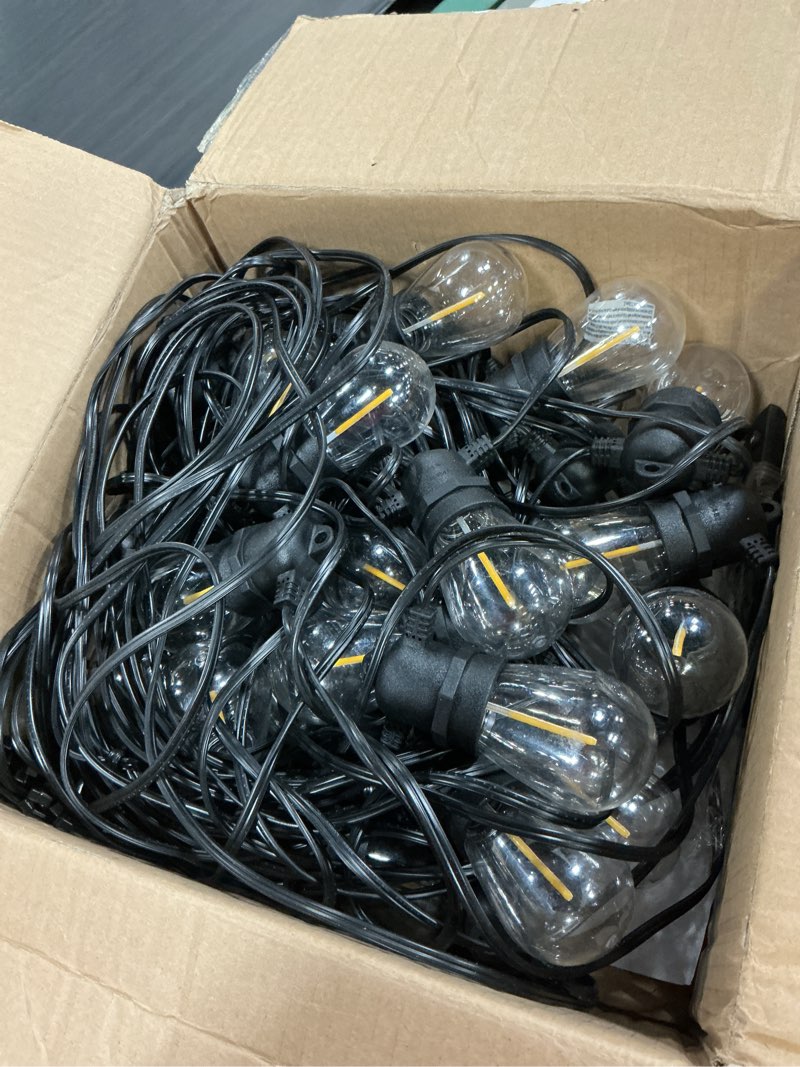 Condition photo showing As Is for minetom 100ft solar-string-lights-outdoor-waterproof, 31+2led s14 shatterproof bulb, patio lights with remote type-c port timable, 3 light modes dimmable solar string lights for outside, yard, camping 100ft(31 sockets)
