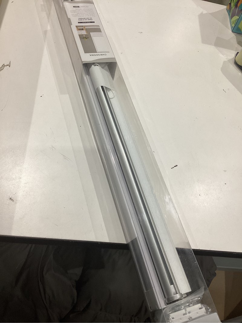 Condition photo showing Good Condition for chrisdowa cordless 100% blackout roller shade, with striped jacquard, thermal insulated, uv protection fabric, total blackout blinds for window, french doors, home and office. white, 32" w x 72" h 32"w x 72"h white