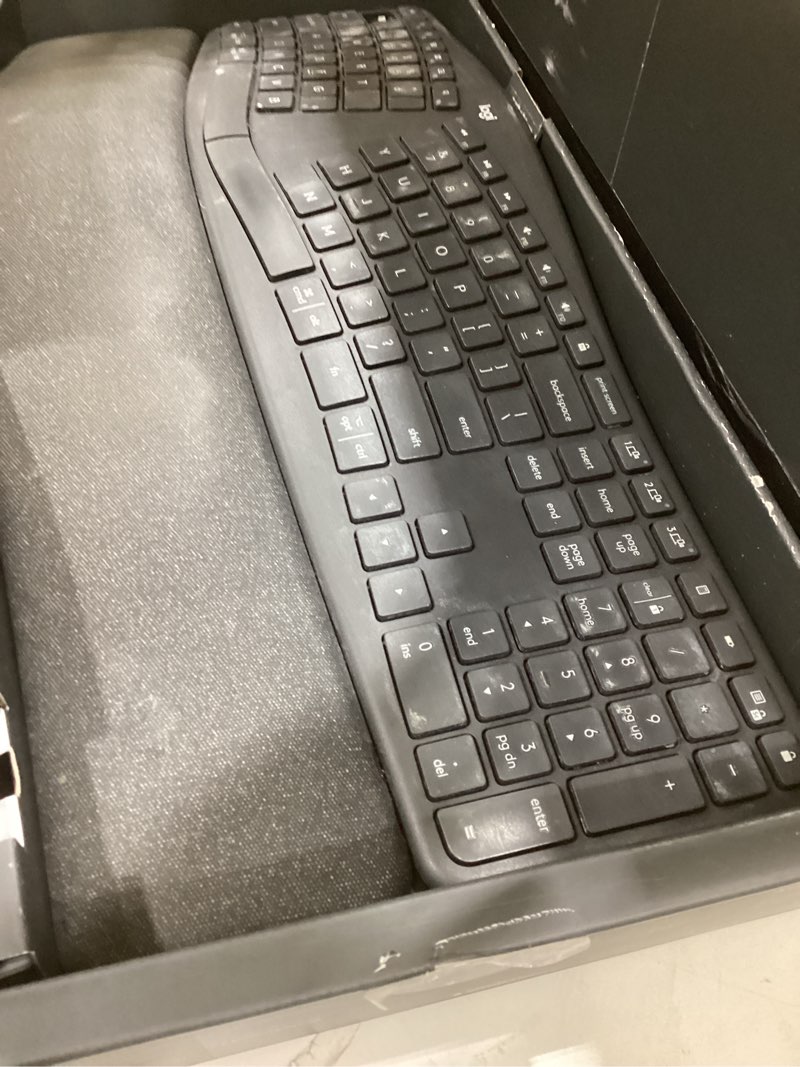 Condition photo showing As Is for logitech ergo k860 wireless ergonomic keyboard - split keyboard, wrist rest, natural typing, stain-resistant fabric, bluetooth and usb connectivity, compatible with windows/mac, black keyboard only