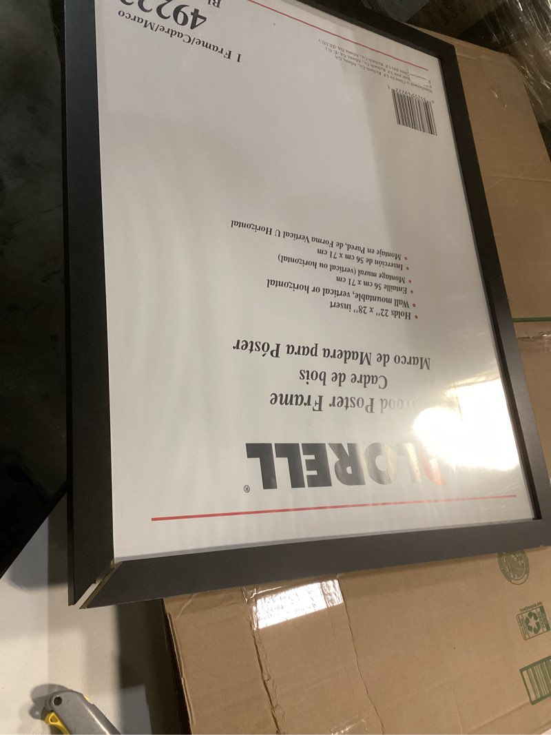 Condition photo showing As Is for Lorell Solid Wood Poster Frame, 22" x 28" (49222) , Black