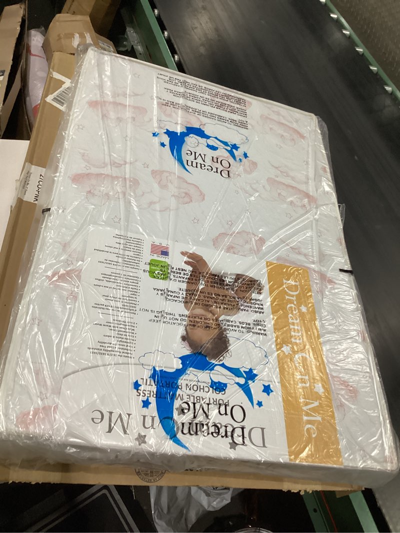 Condition photo showing New/Like New for dream on me sunset 2-in-1 mini crib mattress, dual-sided infant & toddler, waterproof cover, greenguard gold certified, 38” x 24” x 3”, fits mini & select portable cribs, not for playards white