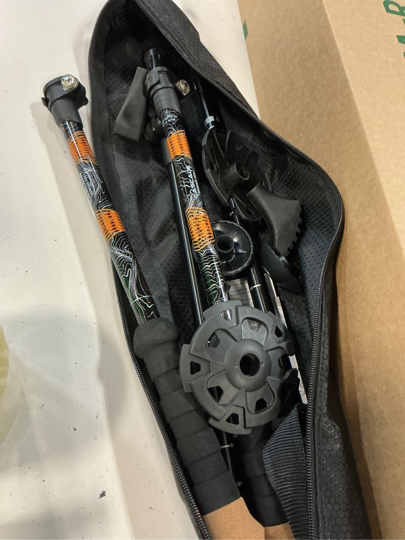 Condition photo showing Good Condition for cascade mountain tech lightweight aircraft-grade aluminum trekking poles with extended down grip plus tip kit orange (cork grip) quick lock trekking poles