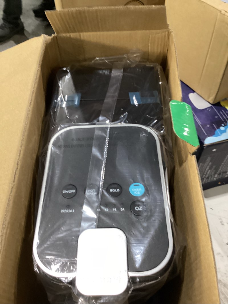 Condition photo showing New/Like New for tastyle single serve coffee maker, iced and hot coffee machine for k cup & grounds, compact design, 40oz removable water reservoir, 6 to 24 oz brew sizes, fits 7.3" travel mug, black