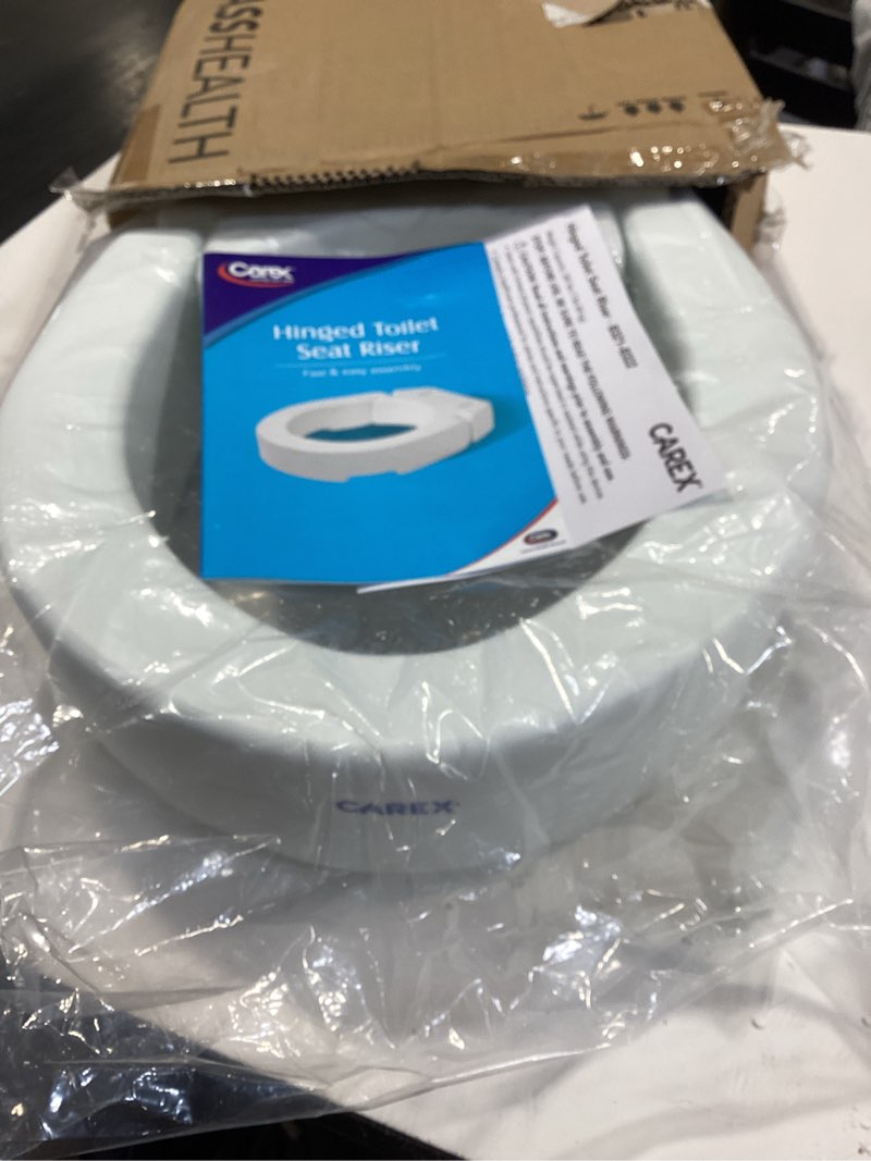 Condition photo showing Good Condition for carex round hinged raised toilet seat, elongated toilet seat riser, adds 3.5 inches of height, 300 lbs capacity, elevating and raising seat for elderly and handicap, universal, slip-resistant, white