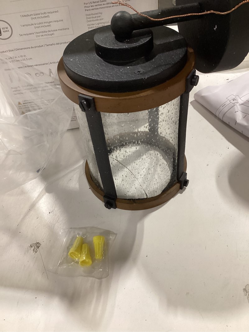 Condition photo showing As Is for kichler barrington 1 -light 10-in h distressed black hardwired outdoor wall light