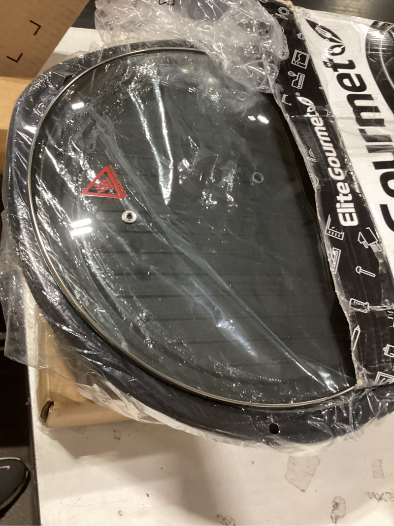 Condition photo showing As Is for elite gourmet emg-980bx large indoor electric round nonstick grill cool touch fast heat up ideal low-fat meals dishwasher safe includes glass lid, 14", black granite