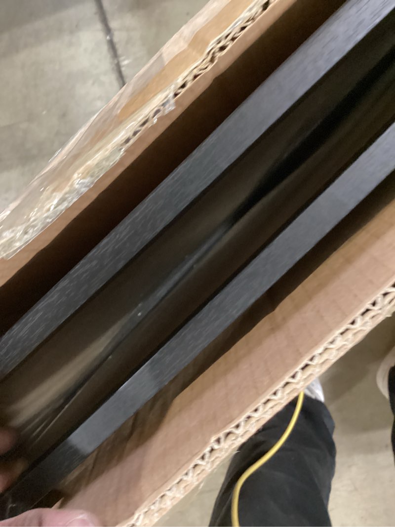 Condition photo showing Good Condition for muzilife 24×36" black poster frames 2 pack, engineered wood poster picture frames with plexiglass cover and hanging hardware for horizontal or vertical wall mounting, large