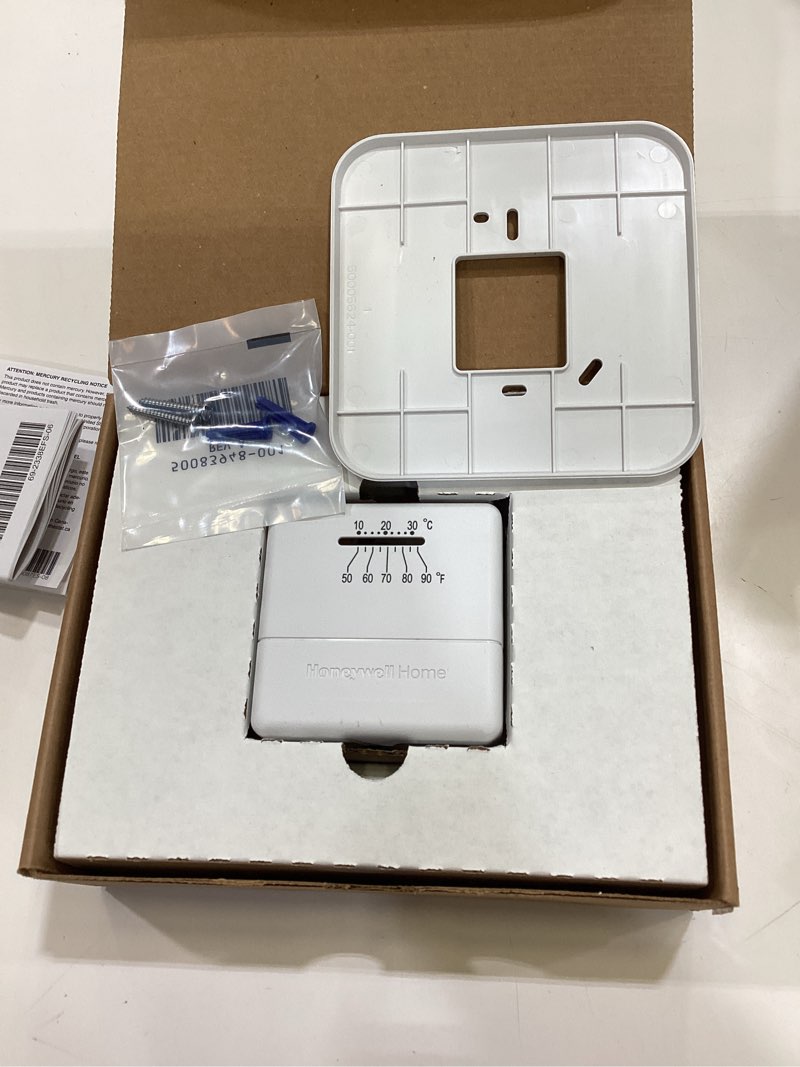 Condition photo showing As Is for honeywell home heating dial non-programmable thermostat