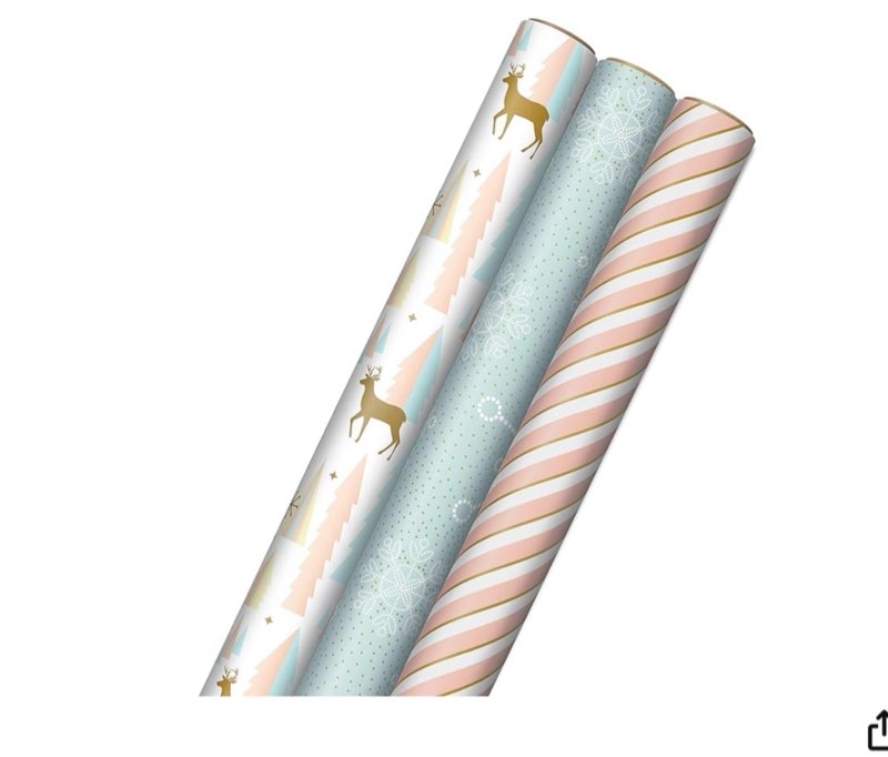 hallmark pink christmas wrapping paper with cut lines on reverse (incomplete)