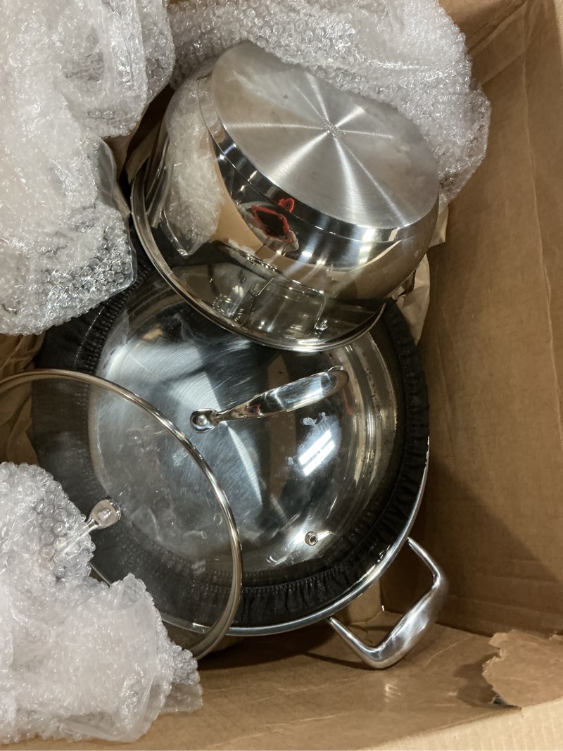 Condition photo showing As Is for Amazon Basics Stainless Steel Cookware Set, 5-Piece Set, All Cooktop Friendly, Dishwasher-Safe